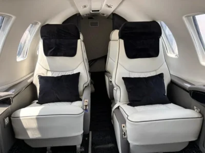 Upgraded Cessna Citation jet interior with modern materials and redesigned cabin layout